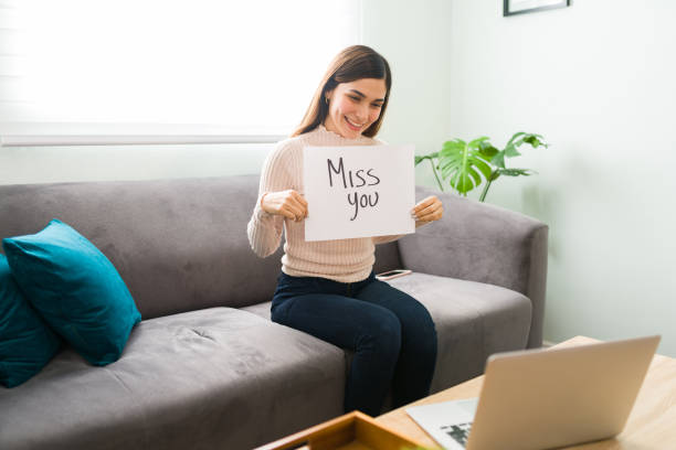 istock Pretty girlfriend missing her boyfriend during a video chat 1296315976