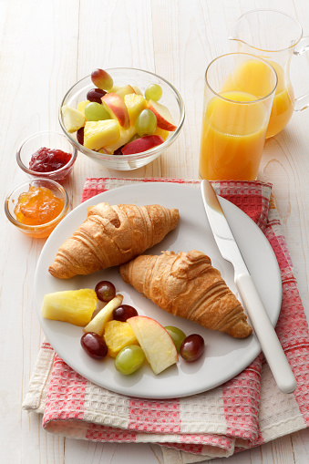 Croissant, Fruit Salad and Orange Juice Still Life. More breakfast and food photos can be found in my portfolio! Please have a look.