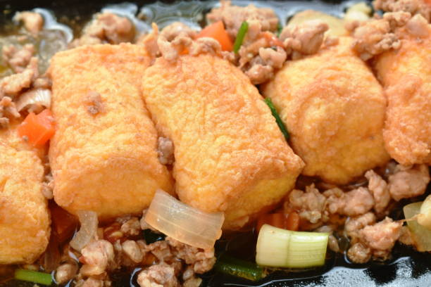 istock deep fried egg tofu with chop pork in sweet sauce 1296316415