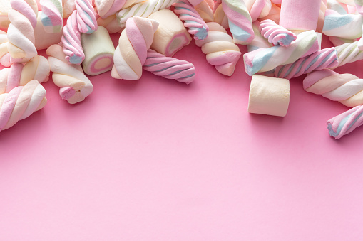 Candy: Marshmallow Candy on Pink Background with Copy Space