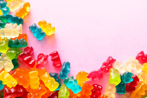 Candy: Gummy Bears on Pink Background with Copy Space