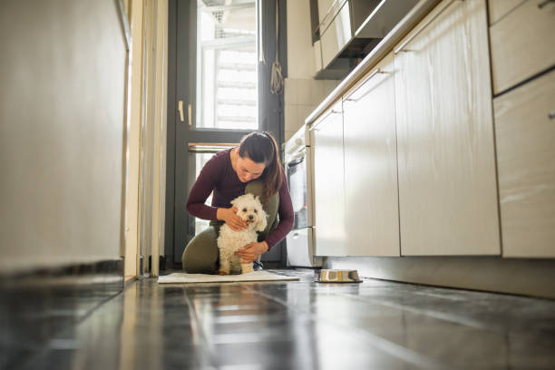 istock Woman and adopted dog 1296320315