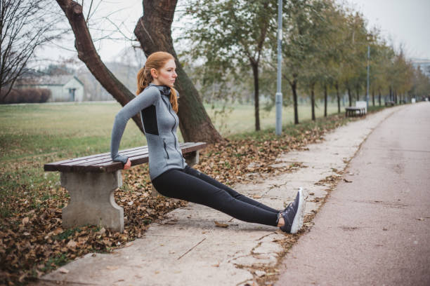 istock Young woman exercising outdoor 1296322734