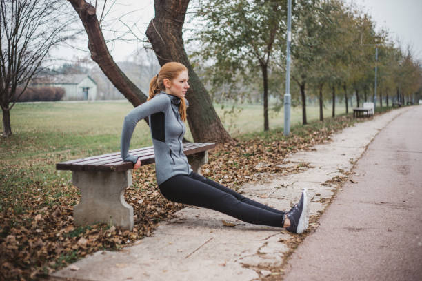istock Young woman exercising outdoor 1296322948