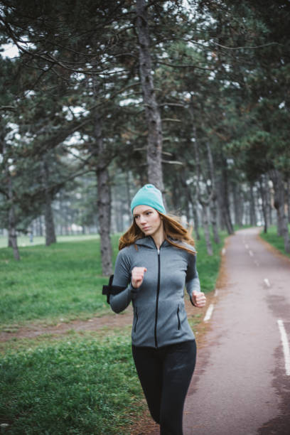 istock Young woman exercising outdoor 1296323122