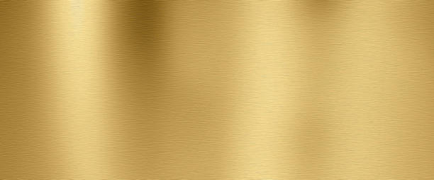 Golden shiny metal texture Golden shiny metal surface with brushed structure"nHorizontal background. Top view. brass stock pictures, royalty-free photos & images