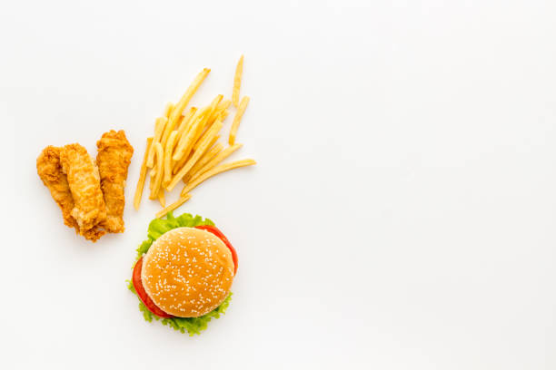 istock Fast food flat lay set. Burger with fried potatoes and chicken, top view 1296325619