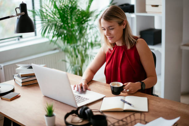 istock Beautiful woman working on a new business plan. 1296326825