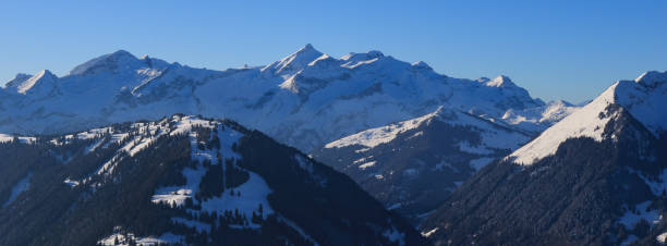 istock Distant view of the Diablerets mountain range in winter. 1296327682