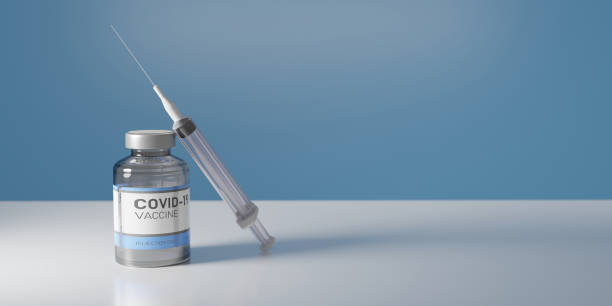 istock CORONAVIRUS VACCINE JAR WITH SYRINGE 1296332794
