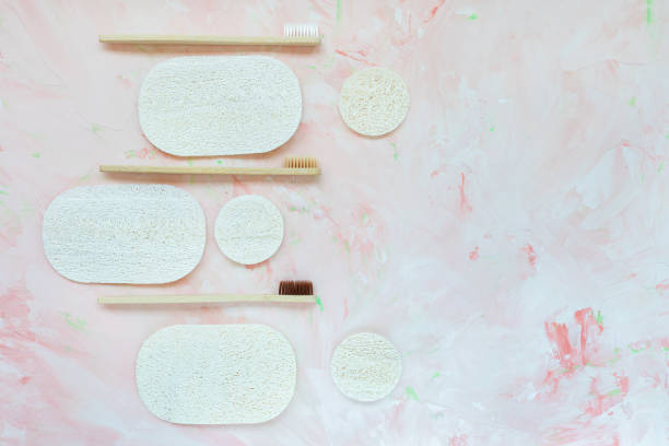 istock Luffa discs and natural wooden bamboo toothbrushes 1296333449