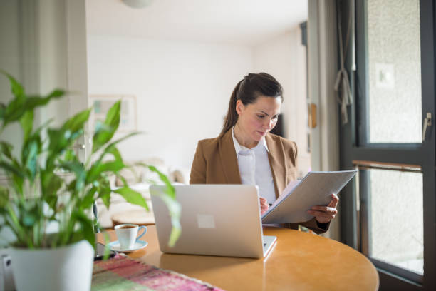 istock Woman working at home office, video call 1296333732
