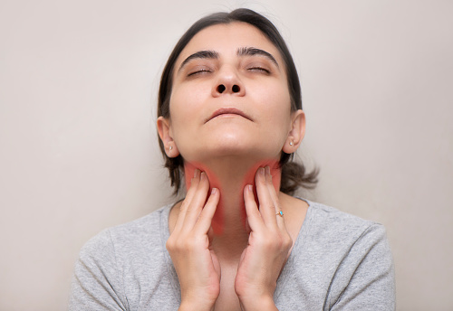 Woman Having Sore Throat