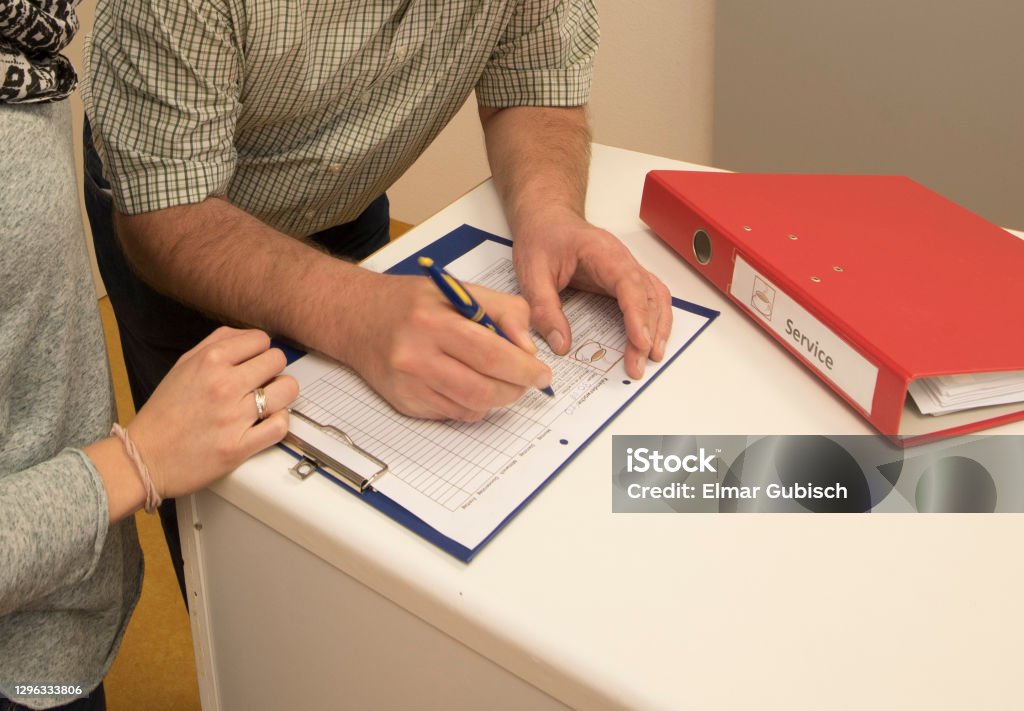 logging and taking notes in the administration logging and taking notes in the administration and office work Civil Servant Stock Photo