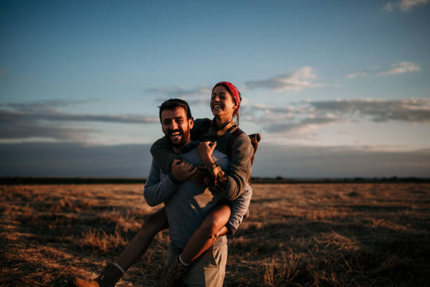 istock A piggyback ride on a sunny day, with a big smile on our face 1296333926