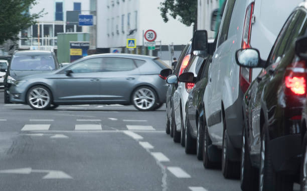 istock traffic jam in the city 1296338797