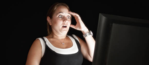 Making eyes to the left is this Russian indoor girl model takes a break from running her Internet influencer business and pulls a play face over the top of her laptop lid.