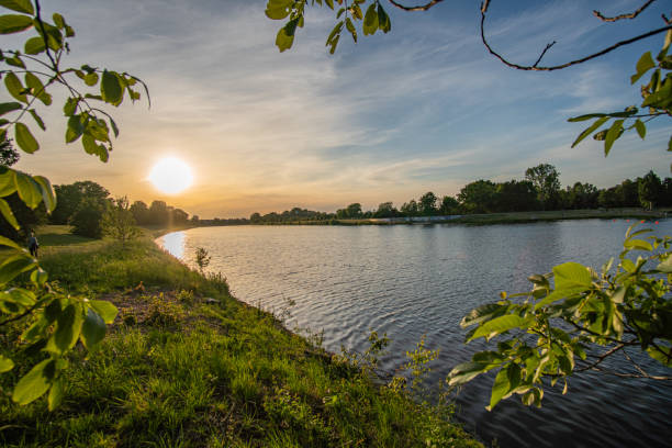 istock beautiful werdersee, a river in bremen surrounded by green at sunset 1296344319