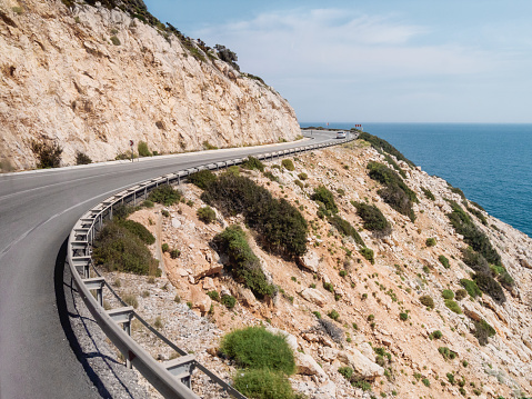 Mountain serpentine road along Mediterranean sea. Demre Finike Yolu (road). Turkey.