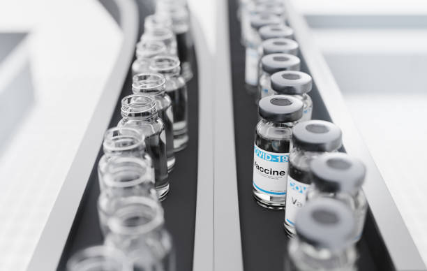 istock Covid-19 Coronavirus Vaccine Vials on a Production Line 1296348172