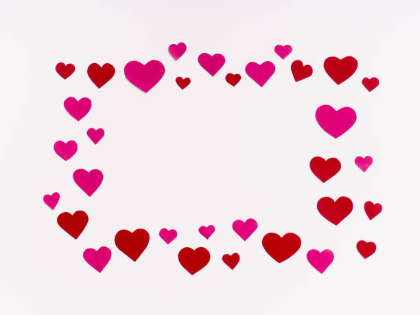 istock Blank postcard  with paper pink and red hearts 1296348413