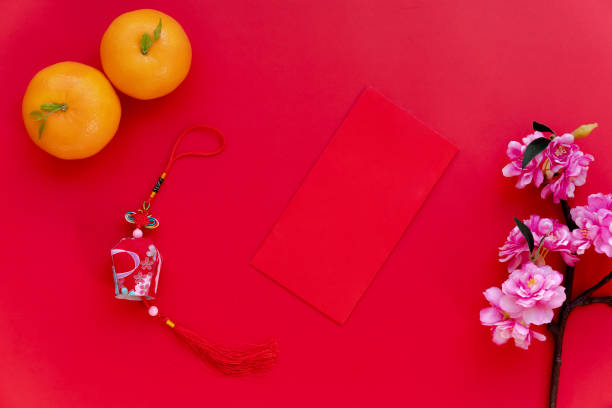 istock Red envelope put on red background, red envelope is gift, orange, blossom and chinese lantern on special days such as chinese new year, 1296348444