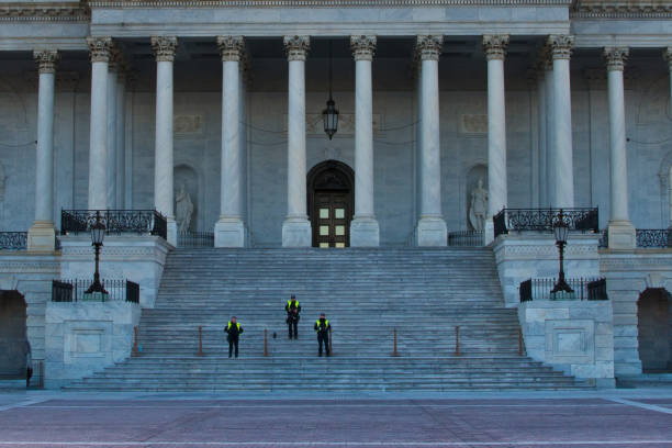 istock Washington DC - Capitol Building with security personnel 1296348625