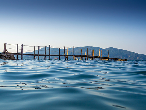 wooden jetty in Greece on the island of Cameo, Zakynthos. Greece.