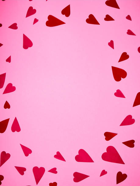 istock Red and pink paper hearts with copy space 1296348809