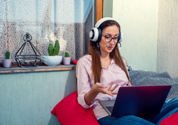 istock Beautiful woman working from home 1296351736