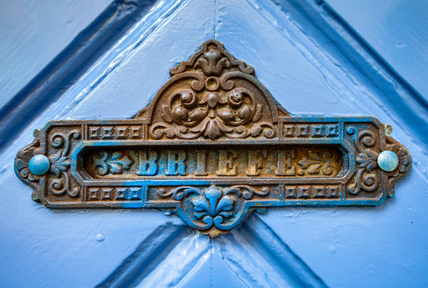 istock old letterbox at a door 1296352890