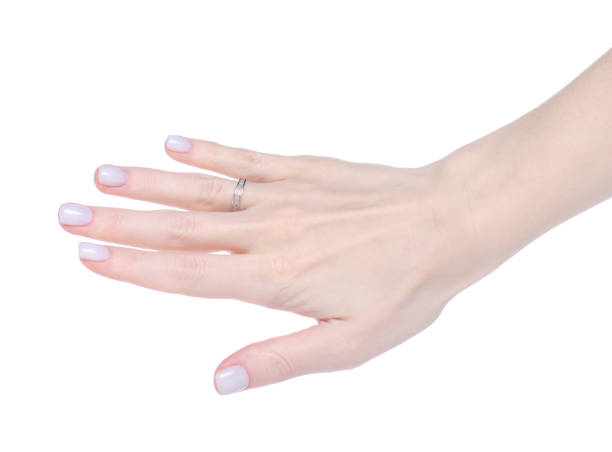 istock Female hand with gold ring of finger 1296353898
