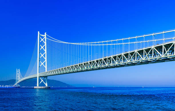 akashi kaikyo brücke in kobe japan - kobe bridge japan suspension bridge stock-fotos und bilder