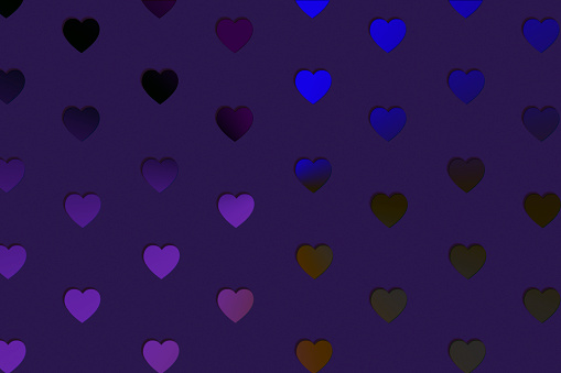 Repetition of heart shaped sequins over violet background