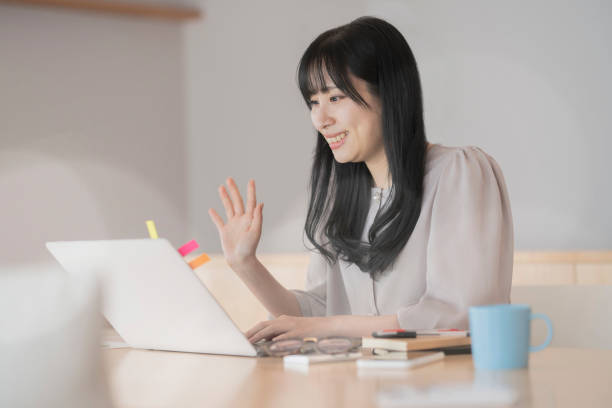 istock A woman waving her hand 1296354389
