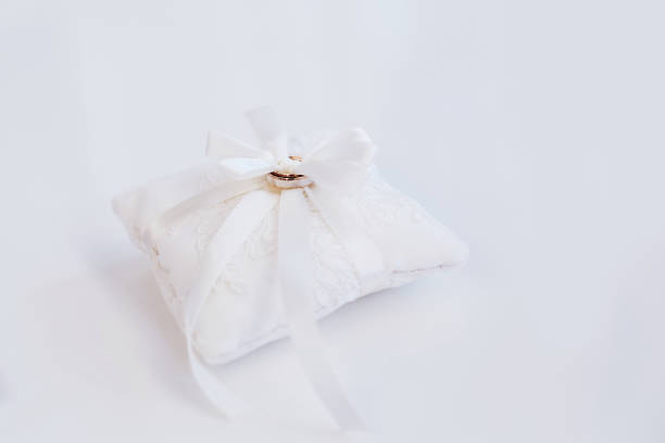 istock Two golden engagement wedding rings 1296355622