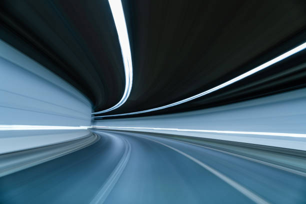 istock POV Car Driving at Empty Tunnel 1296356376