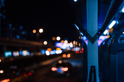 Bus Driving in a City During Night