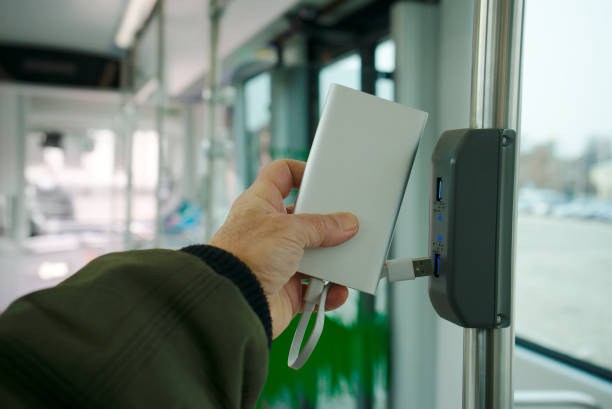 istock Charging Power Bank in a Modern Shuttle Bus 1296357322