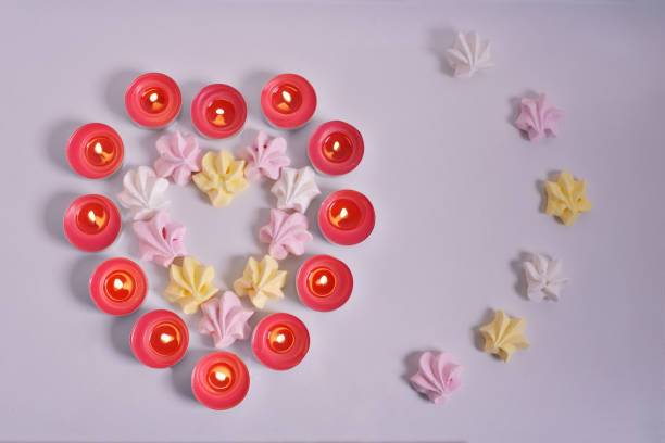 istock Heart of red candles and marshmallows 1296358398