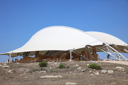 Qrendi, Malta – August 13, 2019: Mnajdra Prehistoric Temple Site from the 5th to the 2nd millennium BC. Now its  protected with tent cover. Malta