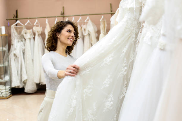 istock Bride choosing a wedding dress 1296361230