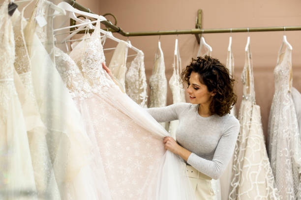 istock Bride choosing a wedding dress 1296361360