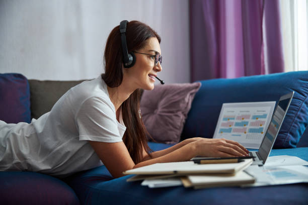istock Cheerful female enjoying gynecologist conference online during quarantine 1296361620