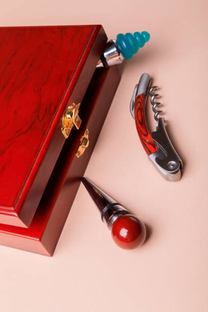 istock Wine corks and bottle openers set in a wooden box. 1296365861