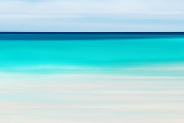 istock A seascape abstract with panning motion combined with a long exposure.  Image displays soft, pastel colors in a retro style. 1296365970