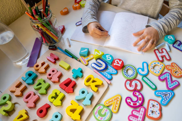 istock Little Boy learning Number and Letters at Home 1296368976