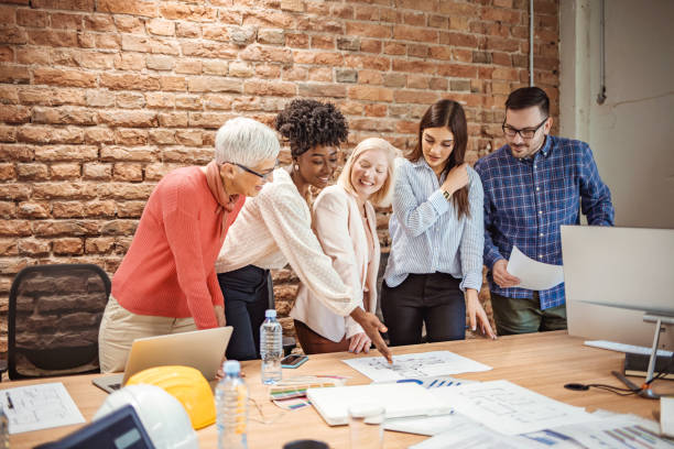 istock Group of business workers smiling happy and confident. 1296369337