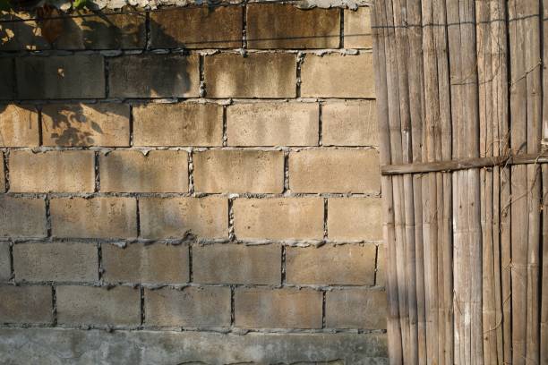 istock Brick wall on the side of the road 1296370407