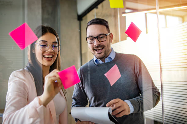 istock Business people meeting at office and use post it notes to share idea. 1296370421